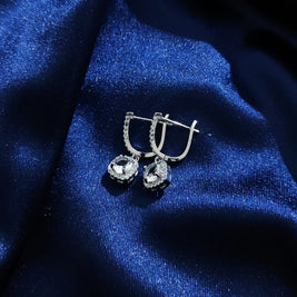 Luxe oorbellen met witte stenen